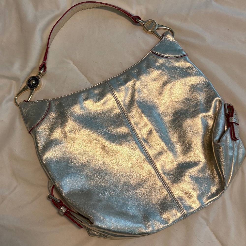Dooney & Bourke.  A Metallic Silver Leather Shoulder Bag